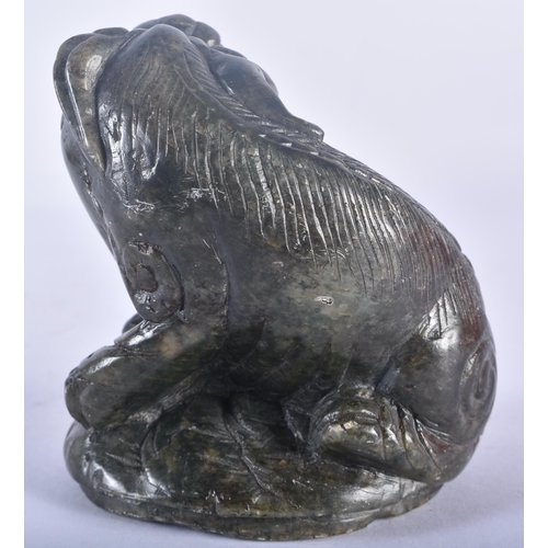 361 - A 19TH CENTURY CHINESE CARVED GREEN STONE FIGURE OF A RECUMBENT BEAST Qing. 12 cm x 7.5 cm.