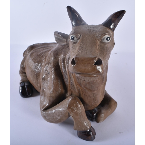 362 - AN UNUSUAL LATE 19TH CENTURY CHINESE CARVED POTTERY FIGURE OF A RECUMBENT BULL Late Qing. 32 cm x 24... 