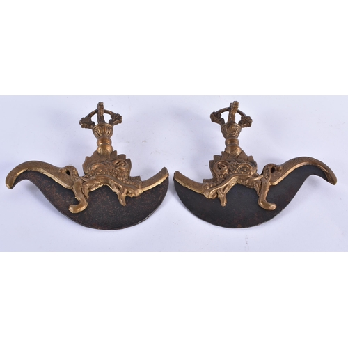 369 - A PAIR OF 19TH CENTURY TIBETAN BRONZE DRAGON BEAST VAJRA KNIVES. 15 cm x 17 cm.