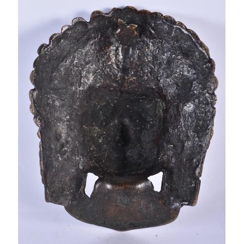 370 - A LARGE 19TH CENTURY TIBETAN BRONZE BUDDHISTIC MASK HEAD depicting a scowling male and serpents. 20 ... 