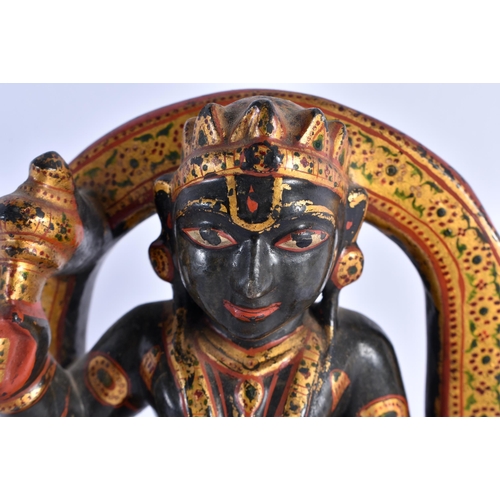 372 - A RARE 18TH/19TH CENTURY INDIAN PAINTED AND LACQUERED STONE BUDDHA possibly jade, formed as a deity ... 