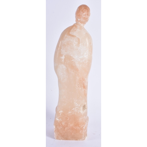 376 - AN EARLY EUROPEAN CARVED ALABASTER FIGURE OF A STANDING SAINT modelled with hands clasped upon a nat... 