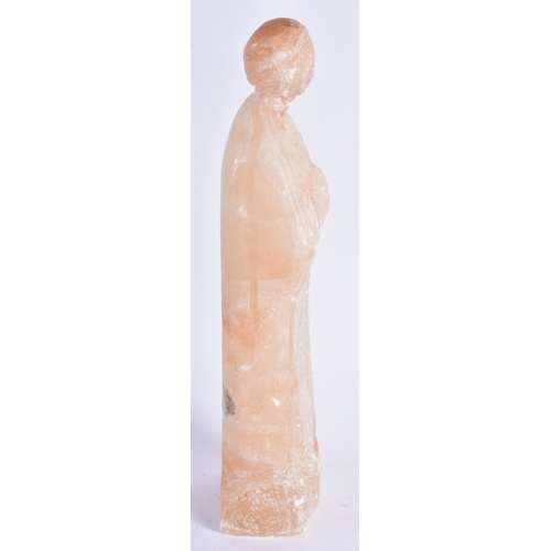 376 - AN EARLY EUROPEAN CARVED ALABASTER FIGURE OF A STANDING SAINT modelled with hands clasped upon a nat... 