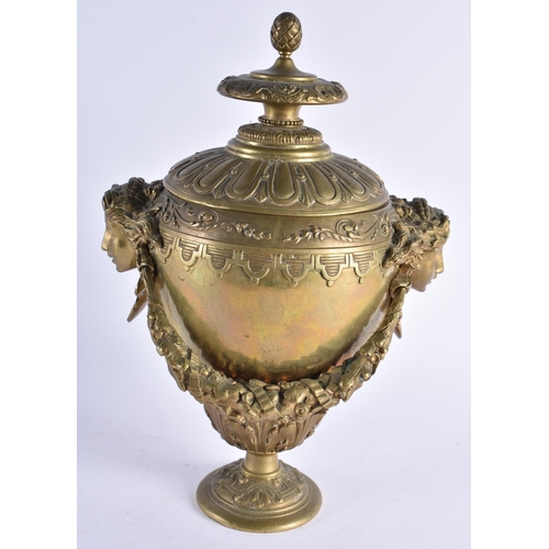 377 - A GOOD MID 19TH CENTURY FRENCH BRONZE TWIN HANDLED VASE AND COVER formed with female mask heads hold... 