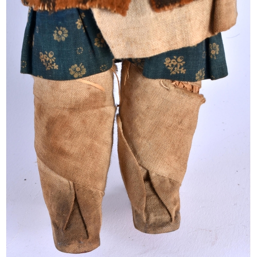 383 - A NATIVE AMERICAN TRIBAL FELT EMBROIDERED DOLL together with an unusual tribal rope twist doll. Larg... 