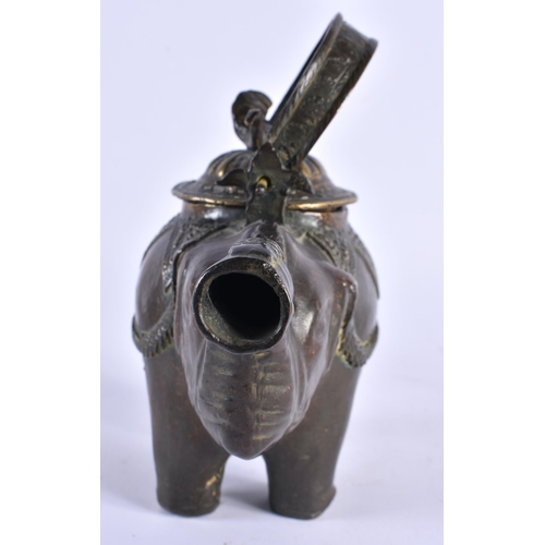 391 - A 19TH CENTURY INDIAN BRONZE ELEPHANT TEAPOT AND COVER together with a smaller Indian elephant plaqu... 