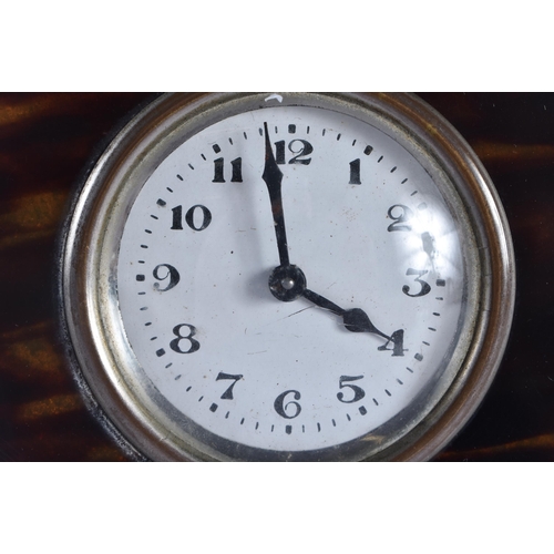 409 - AN ART DECO CHROME AND TORTOISESHELL DESK CLOCK with white enamel dial. 10.25cm diameter.