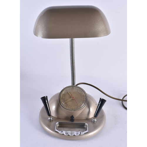 413 - A LARGE RARE RETRO GOBLIN CLOCK AND INK DESK STAND together with a vintage camera & copy of 1935 vog... 