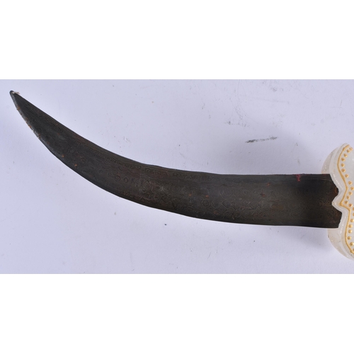 424 - A MIDDLE EASTERN CARVED WHITE HARDSTONE NIELLO DAGGER. 35 cm long.