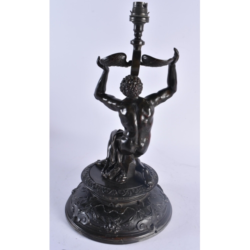 429 - A 19TH CENTURY EUROPEAN BRONZED SPELTER COUNTRY HOUSE GRAND TOUR LAMP formed as a male holding aloft... 