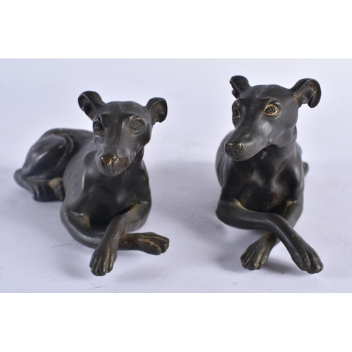 435 - A LOVELY PAIR OF REGENCY COUNTRY HOUSE BRONZE FIGURES OF GREYHOUNDS modelled recumbent. 15 cm x 7 cm... 