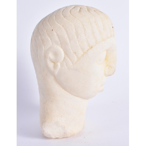 436 - A 19TH CENTURY MIDDLE EASTERN CARVED WHITE MARBLE IDOL After the Antiquity. 9.5 cm x 6.5 cm.