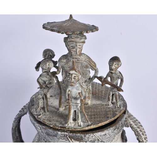 442 - AN AFRICAN TRIBAL BRONZE VESSEL AND COVER formed with figures upon an open work base. 24 cm x 13 cm.