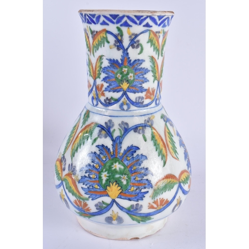 447 - A LARGE TURKISH KUTAHYA IZNIK STYLE POTTERY JUG. 23.5 cm high.