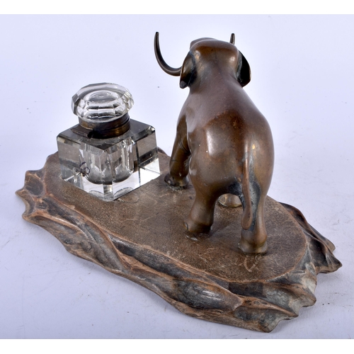 457 - A 19TH CENTURY FRENCH ELEPHANT BRONZE INKWELL upon a Japanese carved wood base. 21 cm x 12 cm.