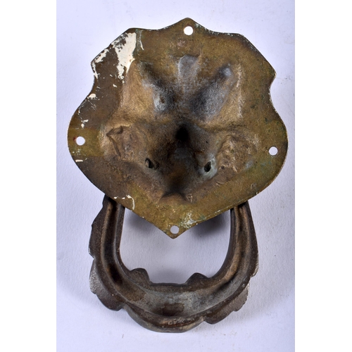 478 - A RARE 19TH CENTURY CHINESE TIBETAN BRONZE DOOR KNOCKER formed as a beast.15 cm x 9 cm.