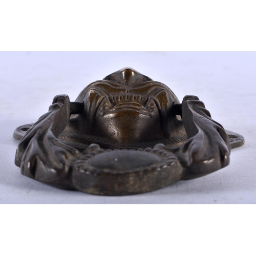 478 - A RARE 19TH CENTURY CHINESE TIBETAN BRONZE DOOR KNOCKER formed as a beast.15 cm x 9 cm.