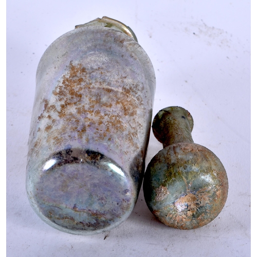 481 - TWO ROMAN GLASS COSMETIC JARS. Largest 10 cm high. (2)