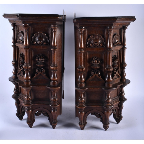 485 - A FINE AND UNUSUAL PAIR OF 17TH/18TH CENTURY FLEMISH BAROQUE CARVED OAK STANDS also mounted for wall... 