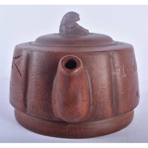 489 - THREE CHINESE YIXING POTTERY TEAPOTS AND COVERS possibly Republican period. Largest 20 cm wide. (3)