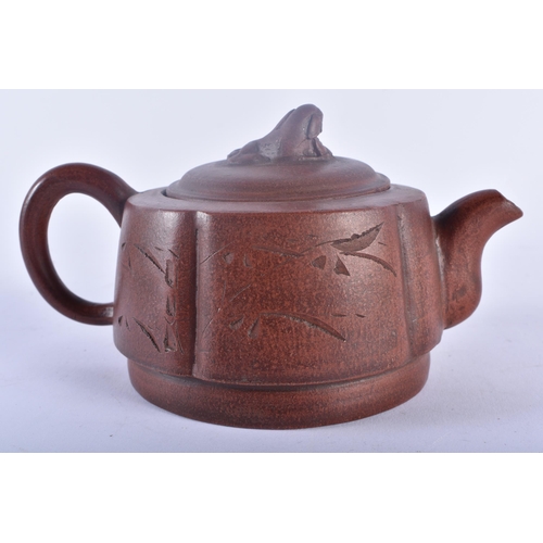 489 - THREE CHINESE YIXING POTTERY TEAPOTS AND COVERS possibly Republican period. Largest 20 cm wide. (3)