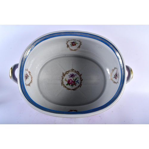 525 - A LARGE SEVRES STYLE CERAMIC PINK GROUND FLORAL FOOT BATH. 55 cm x 38 cm x 20 cm.