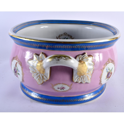 525 - A LARGE SEVRES STYLE CERAMIC PINK GROUND FLORAL FOOT BATH. 55 cm x 38 cm x 20 cm.