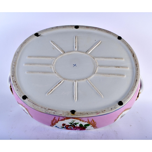 525 - A LARGE SEVRES STYLE CERAMIC PINK GROUND FLORAL FOOT BATH. 55 cm x 38 cm x 20 cm.