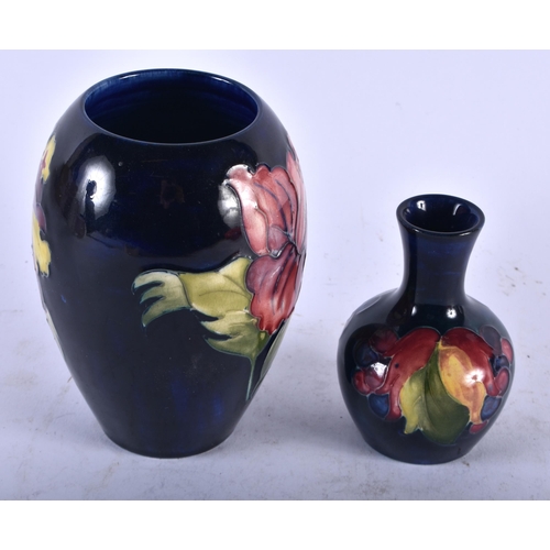 527 - TWO MOORCROFT VASES. Largest 13 cm high. (2)