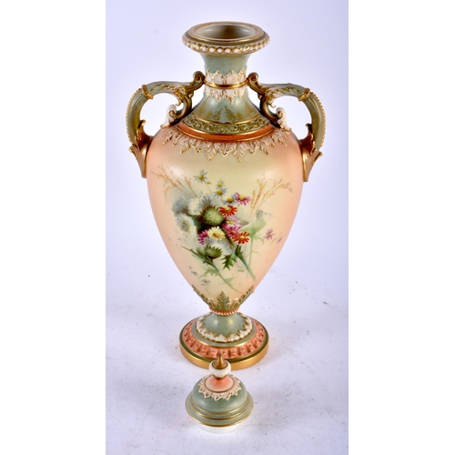 531 - A LARGE ROYAL WORCESTER TWIN HANDLED BLUSH IVORY VASE painted with Autumnal flowers in the manner of... 