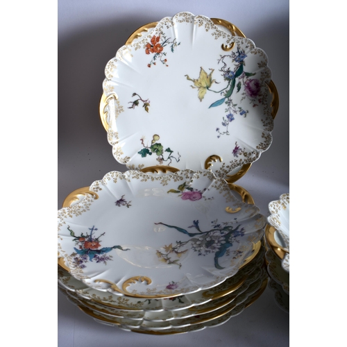 532 - A COLLECTION OF HAVILAND & CIE LIMOGES PORCELAIN PLATES AND DISHES decorated with foliage. Largest 2... 