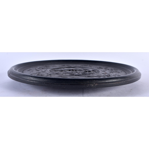 533 - A LARGE 19TH CENTURY BOIS DERCI EBONISED CLASSICAL RELIEF DISH decorated with figures. 30 cm diamete... 