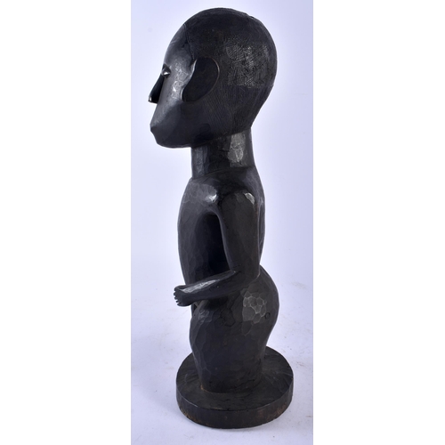 537 - AN AFRICAN TRIBAL WOOD FIGURE. 39 cm high.