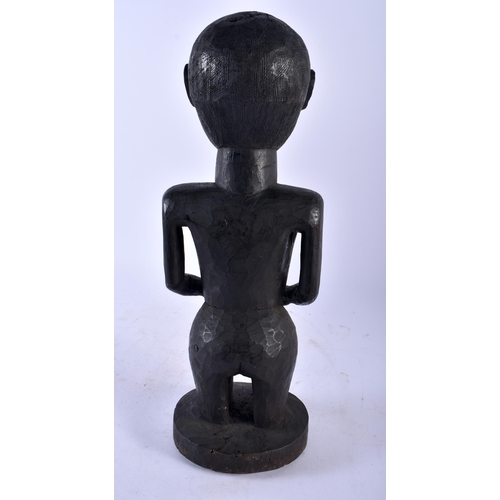 537 - AN AFRICAN TRIBAL WOOD FIGURE. 39 cm high.