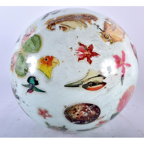 538 - AN ANTIQUE DECLOMANIA GLASS BALL. 25cm wide.