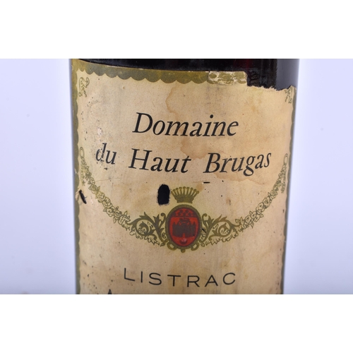 540 - A BOTTLE OF DOMAINE DU HAUT BRUGAS 1967 RED WINE. 30 cm high.