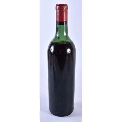 540 - A BOTTLE OF DOMAINE DU HAUT BRUGAS 1967 RED WINE. 30 cm high.