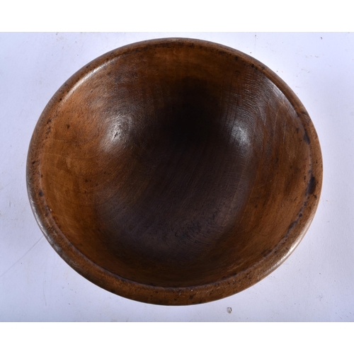 544 - A TREEN BUTTER BOWL. 18 cm diameter.