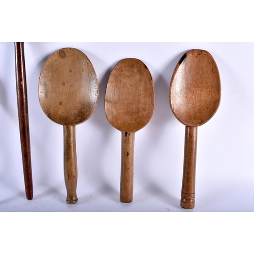 547 - SIX LARGE TREEN DAIRY BUTTER SPOONS. Largest 35 cm long. (6)