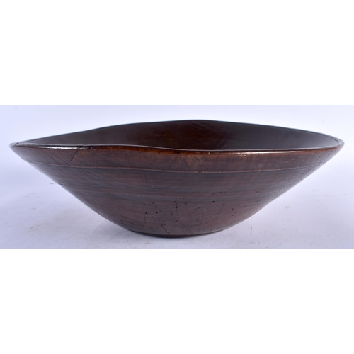 551 - A LARGE FRUITWOOD TREEN BUTTER BOWL. 35 cm diameter.