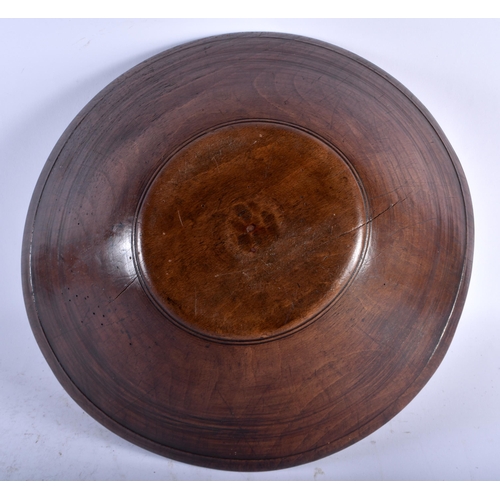 551 - A LARGE FRUITWOOD TREEN BUTTER BOWL. 35 cm diameter.