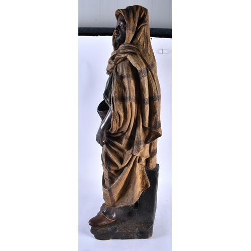 554 - A LARGE ANTIQUE AUSTRIAN GOLDSCHEIDER TERRACOTTA MALE modelled in robes. 78 cm x 28 cm.