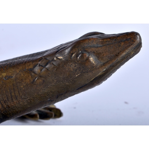 558 - AN ANTIQUE BRONZE FIGURE OF A LIZARD signed Dinant. 22cm wide.