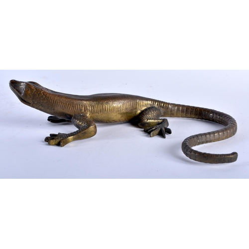 558 - AN ANTIQUE BRONZE FIGURE OF A LIZARD signed Dinant. 22cm wide.