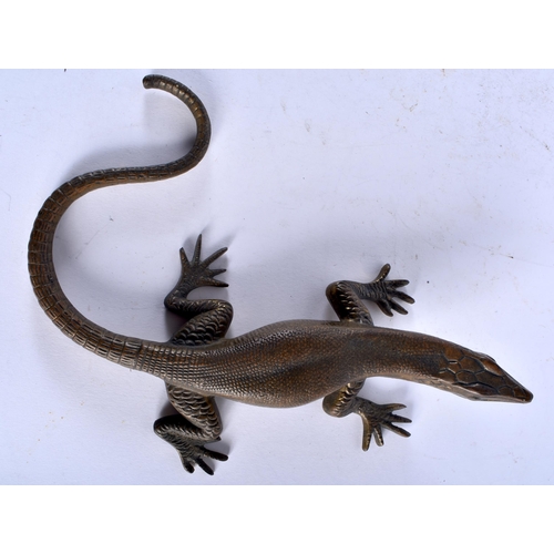 558 - AN ANTIQUE BRONZE FIGURE OF A LIZARD signed Dinant. 22cm wide.