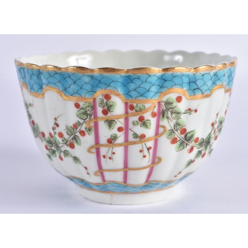 56 - AN 18TH CENTURY WORCESTER FLUTED TEABOWL AND SAUCER painted with trailing flowers under a turquoise ... 