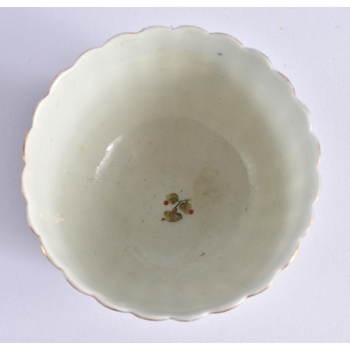 56 - AN 18TH CENTURY WORCESTER FLUTED TEABOWL AND SAUCER painted with trailing flowers under a turquoise ... 