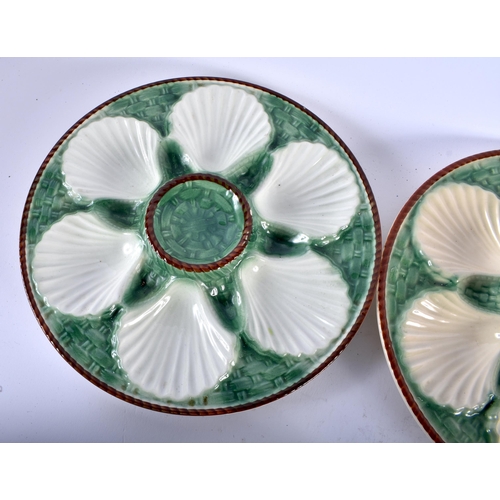 560 - SEVEN 19TH CENTURY FRENCH MAJOLICA OYSTER PLATES. 24 cm diameter. (7)