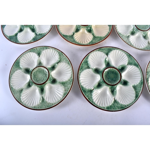 560 - SEVEN 19TH CENTURY FRENCH MAJOLICA OYSTER PLATES. 24 cm diameter. (7)