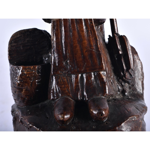 561 - A CHARMING 18TH/19TH CENTURY CONTINENTAL CARVED WOOD MATCH HOLDER formed as a female on a stump. 26 ... 